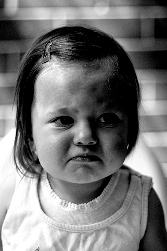 unhappy miserable little girl child baby sad