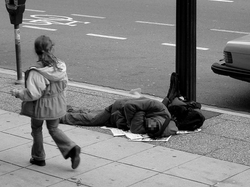 Man_sleeping_on_Canadian_sidewalk_2