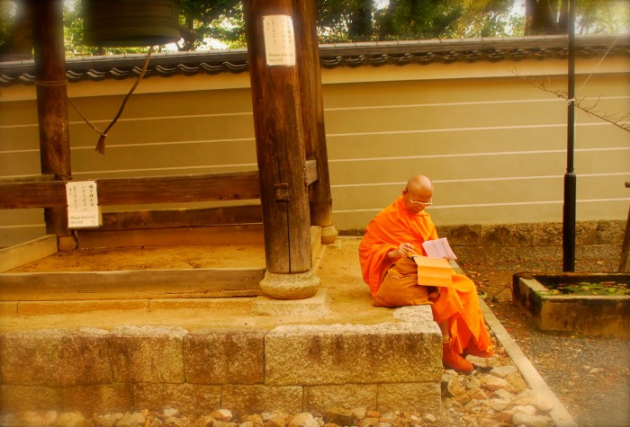 Monk with iPad
