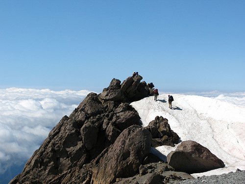 top of the mountain summit climb success