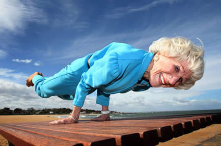 older woman doing yoga