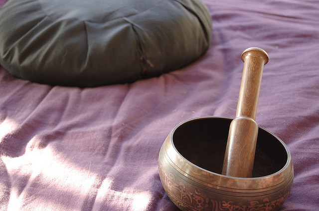 meditation cushion and singing bowl