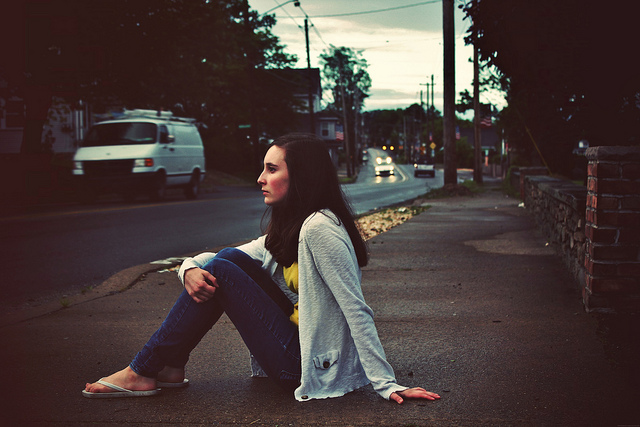 girl sitting outside