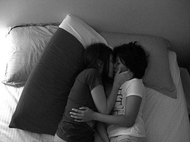 kissing in bed