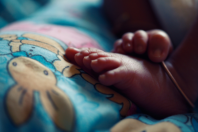 £A baby is born with a need to be loved and never outgrows it. ~ Frank A Clark", Vinoth Chandar, Flickr