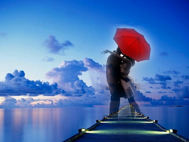 couple lovers red umbrella
