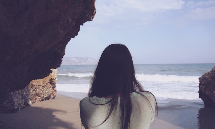 woman alone beach