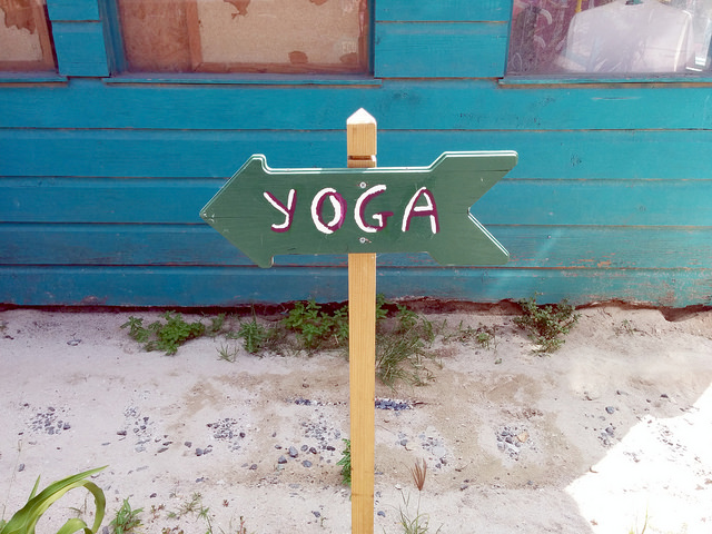 yoga sign beach