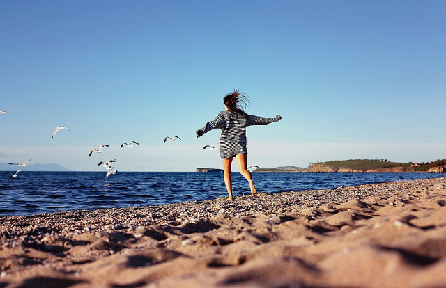girl, running, beach, carefree, happy, seagulls