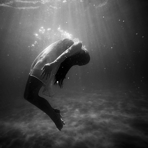 Woman underwater- Kaare Long article