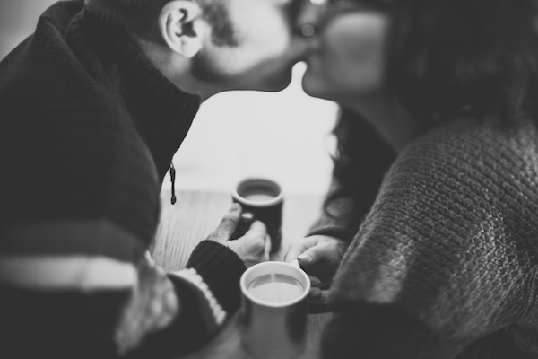 couple kissing coffee cozy love
