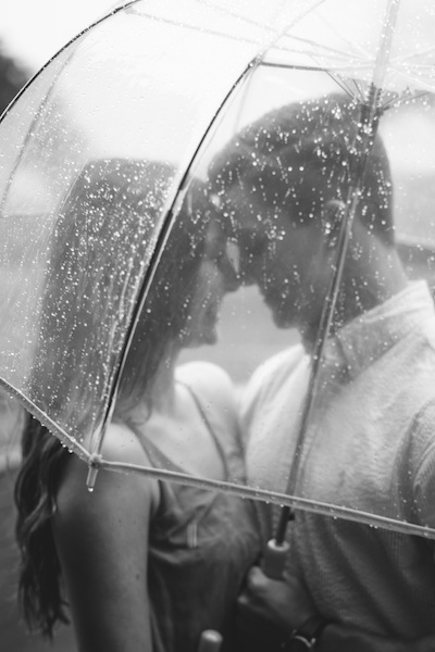 couple under umbrella rainy day