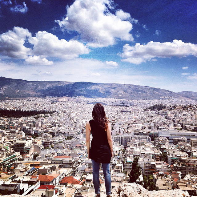 girl woman city athens blue sky clouds alone