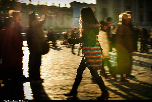 woman walking busy street