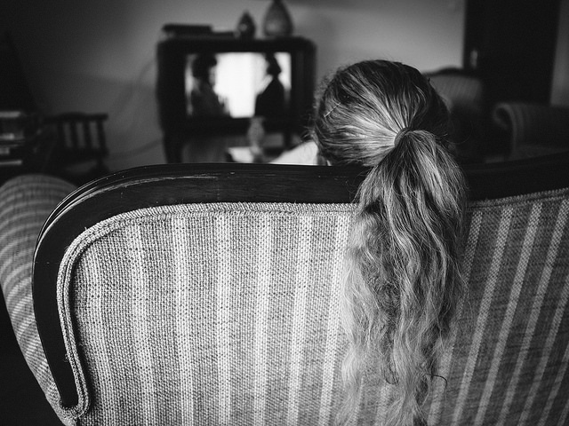 girl numb sad watching TV inactive hair