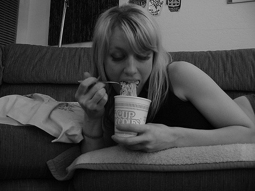 girl eating noodles