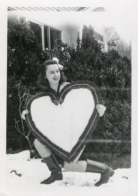 vintage woman holding heart