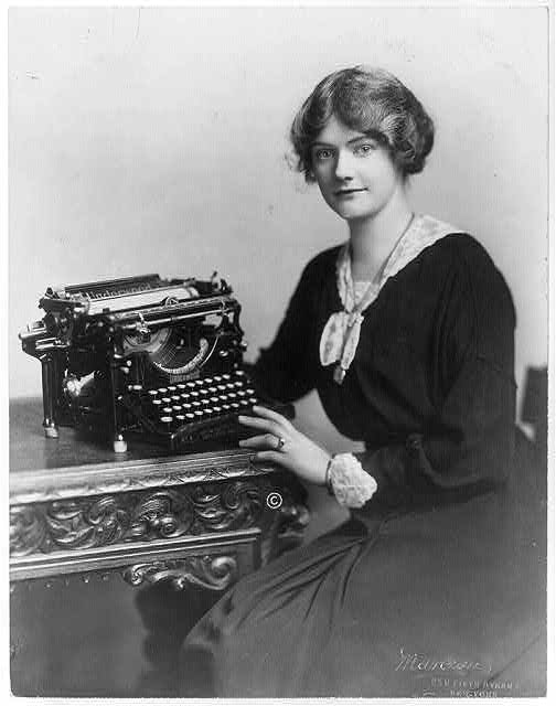 vintage woman typewriter writing