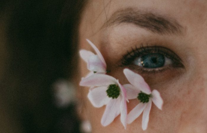 Anna Alexes/Pexels https://www.pexels.com/photo/flowers-on-a-person-s-face-8080192/