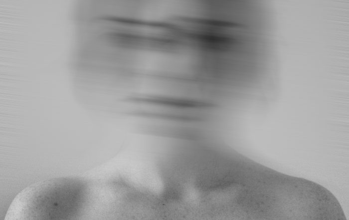 Charlie Devlin/Pexels https://www.pexels.com/photo/grayscale-photo-of-woman-in-black-off-shoulder-top-with-blurred-face-11408864/
